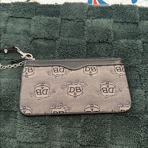 Dooney & Bourke canvas and leather wristlet with key chain